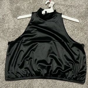 Black top. Scrunches at waist.